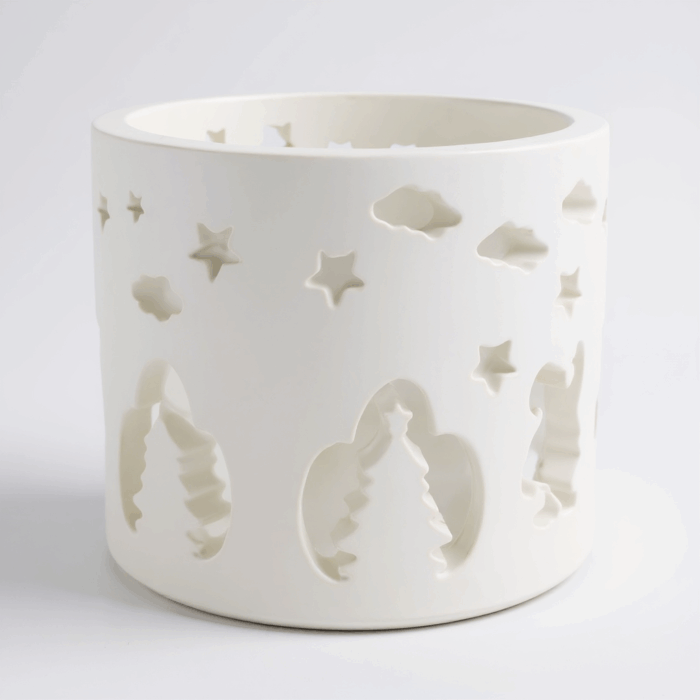 Windlicht mit weihnachtlichen Motiven aus Beton